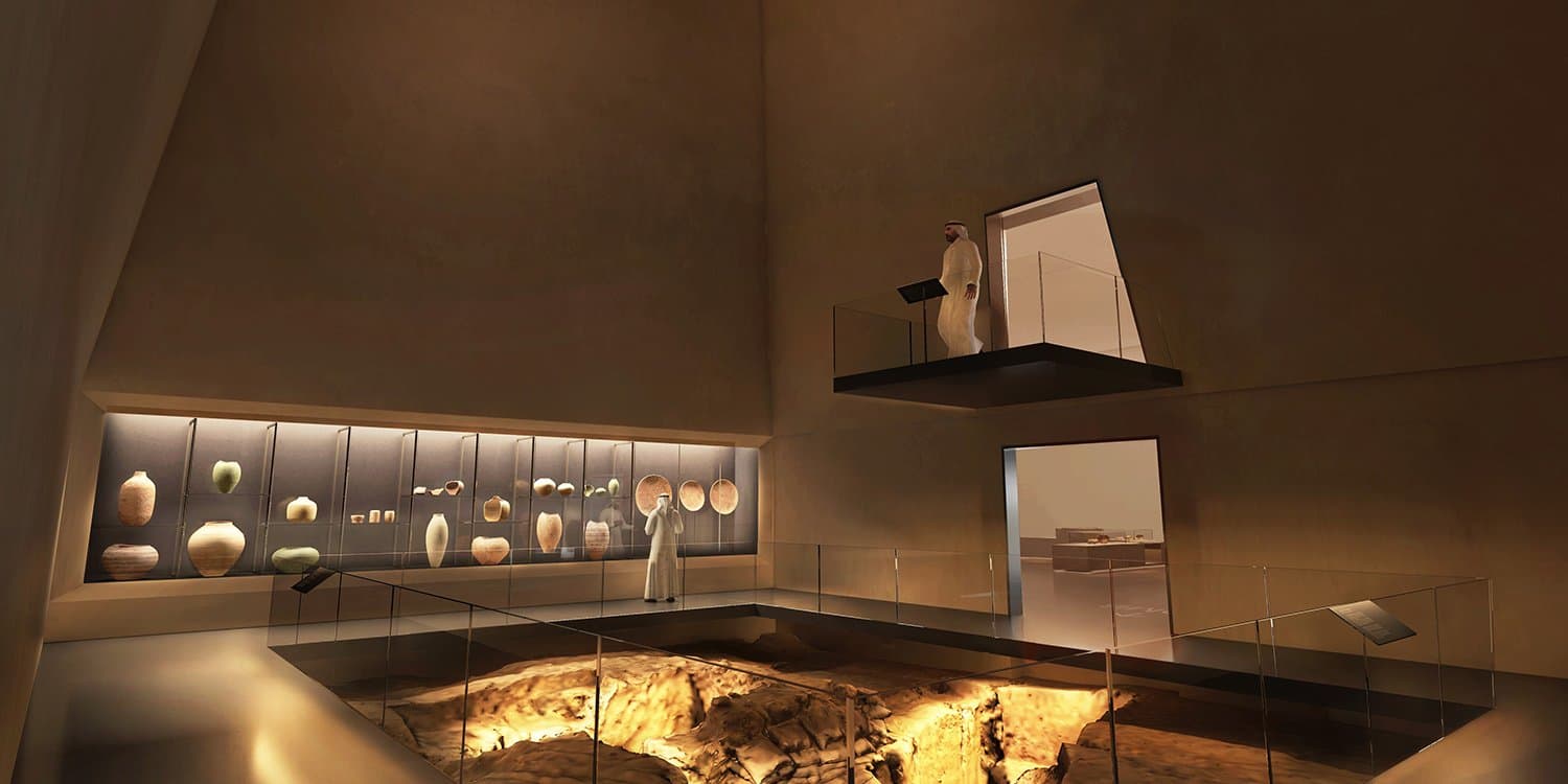 Interior gallery display with ceramics and elevated viewing platform